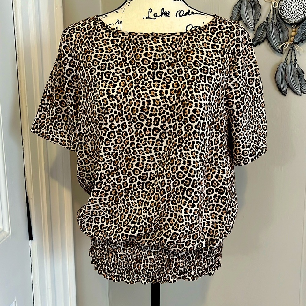 Leopard print Michael Kors cinched waist blouse.